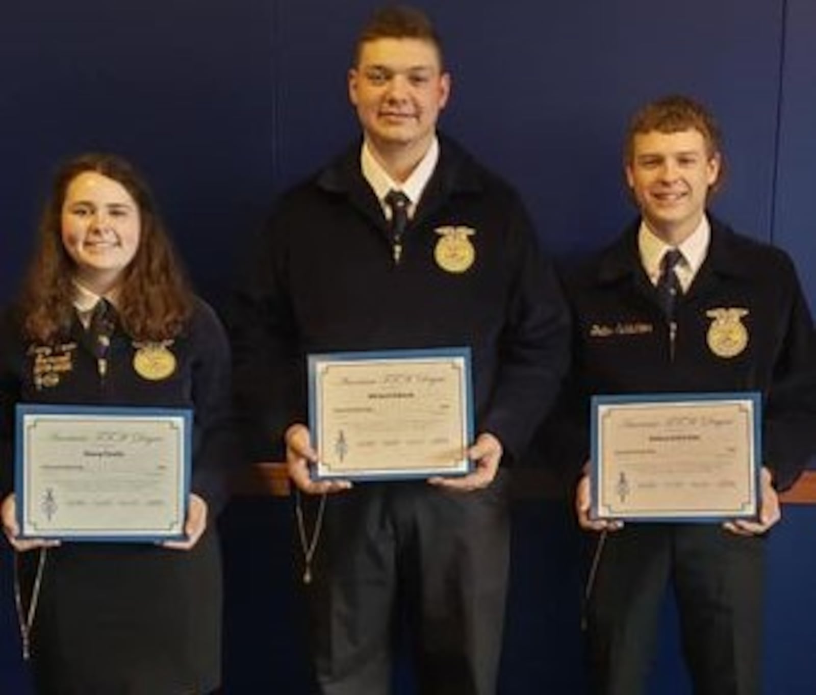 Talawanda graduates Kasey Condo, Michael Schwab and Dalton Schlichter received their American FFA Degree awards at the national convention in October in Indianapolis. CONTRIBUTED