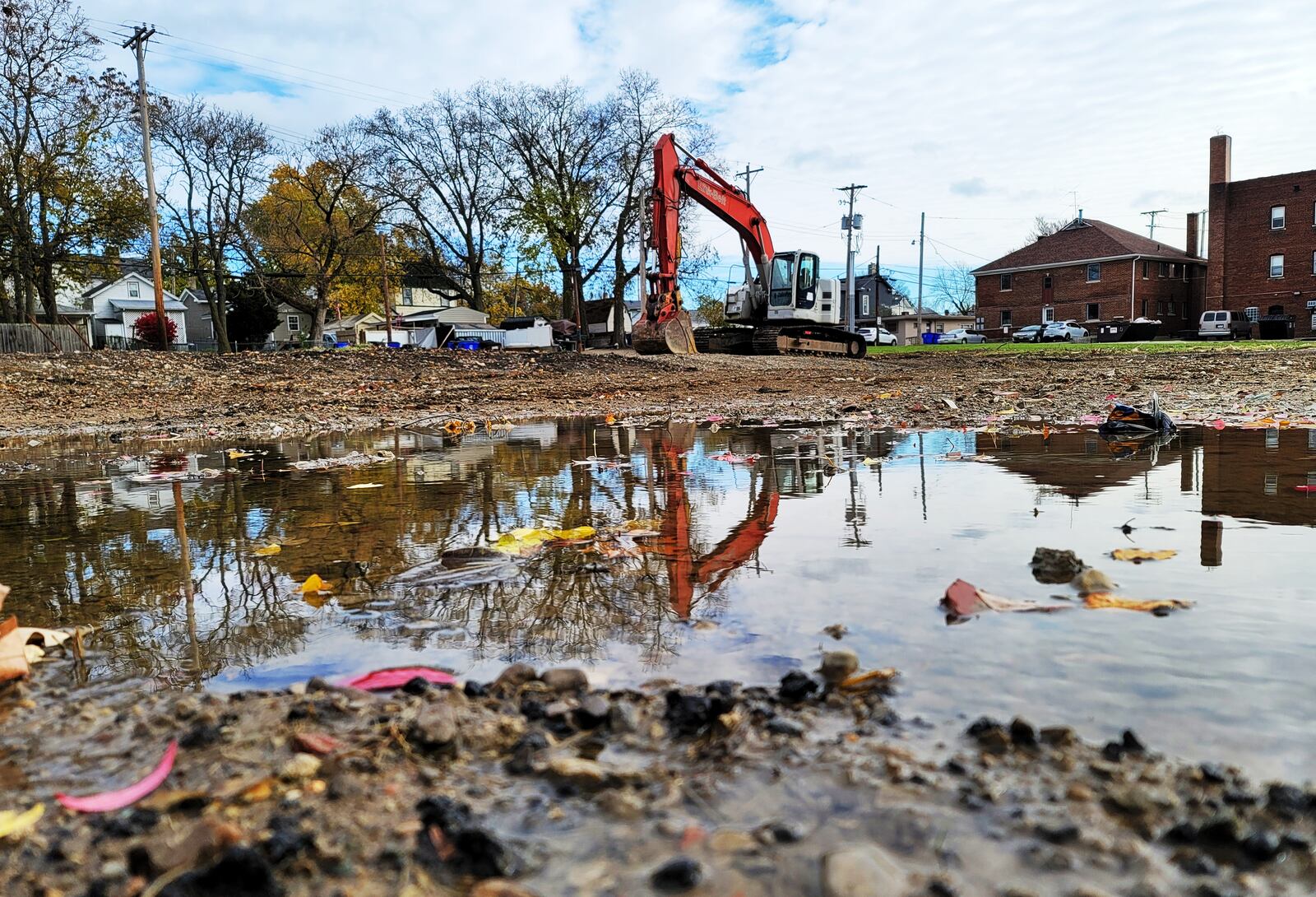 A ground breaking ceremony was held for the Rossville Flats apartments and retail space Monday, Nov. 15, 2021 on Main Street in Hamilton. NICK GRAHAM / STAFF