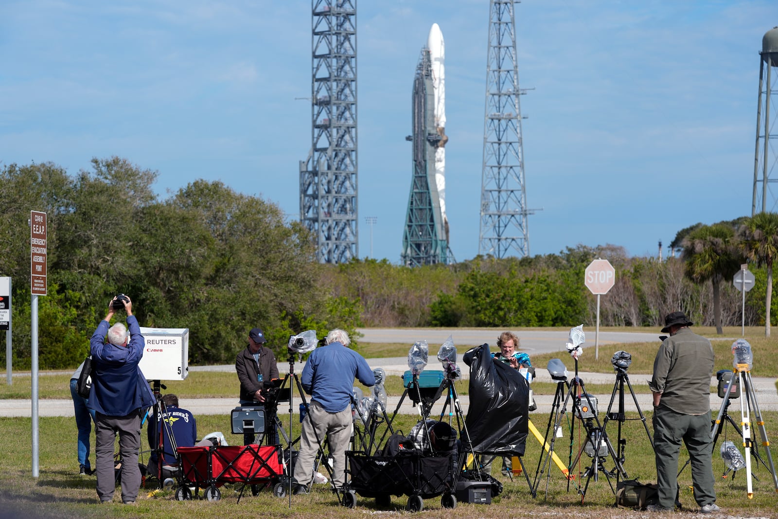 Photographers reset their remote cameras for yet another launch attempt of Blue Origin's New Glenn rocket from Launch Complex 36 at the Cape Canaveral Space Force Station, Wednesday, Jan. 15, 2025, in Cape Canaveral, Fla. (AP Photo/John Raoux)