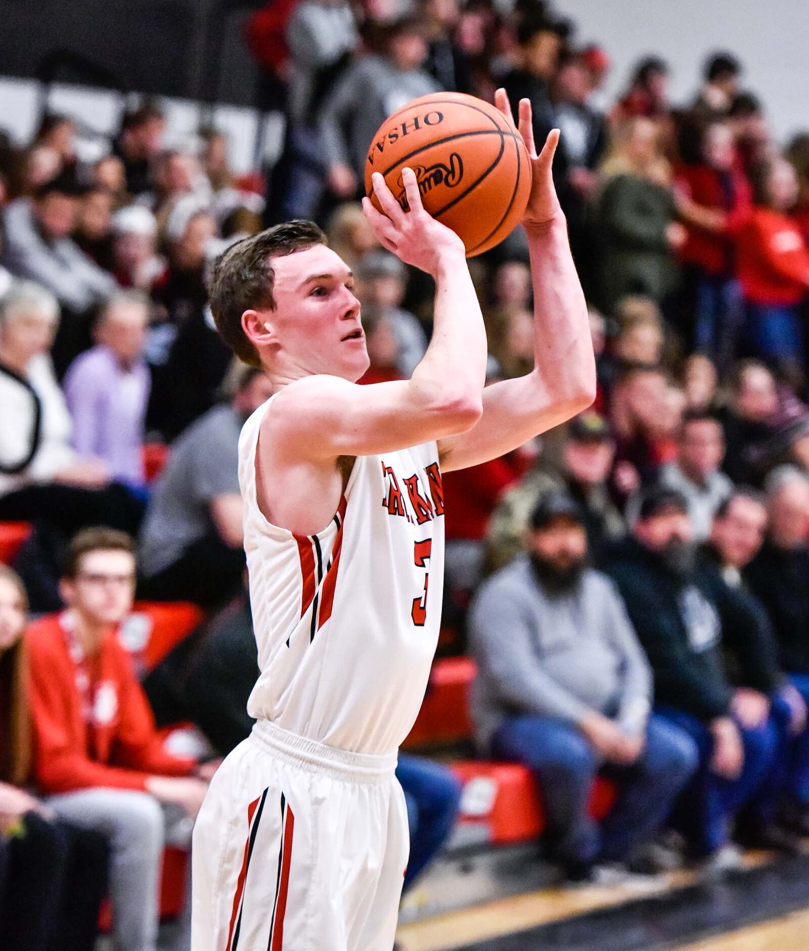 Franklin's Zack Minton launches a 3-pointer during Tuesday night’s game against Carlisle at Darrell Hedric Gym in Franklin. NICK GRAHAM/STAFF