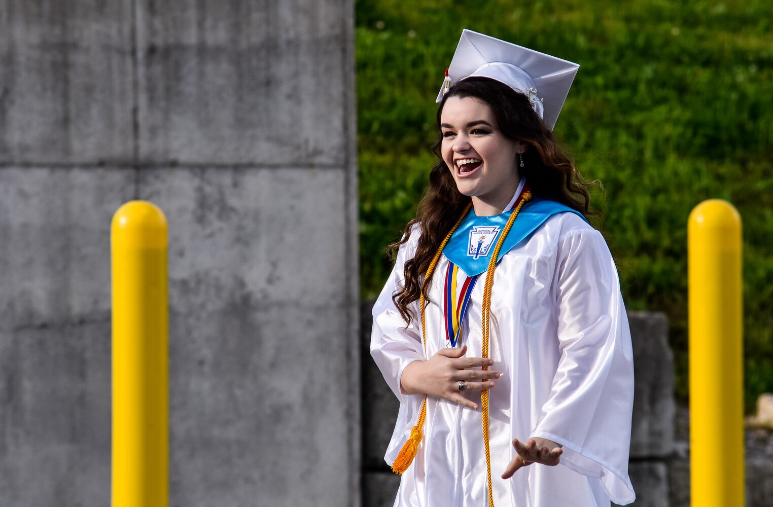 Madison High School drive-thru graduation ceremony at Land of Illusion