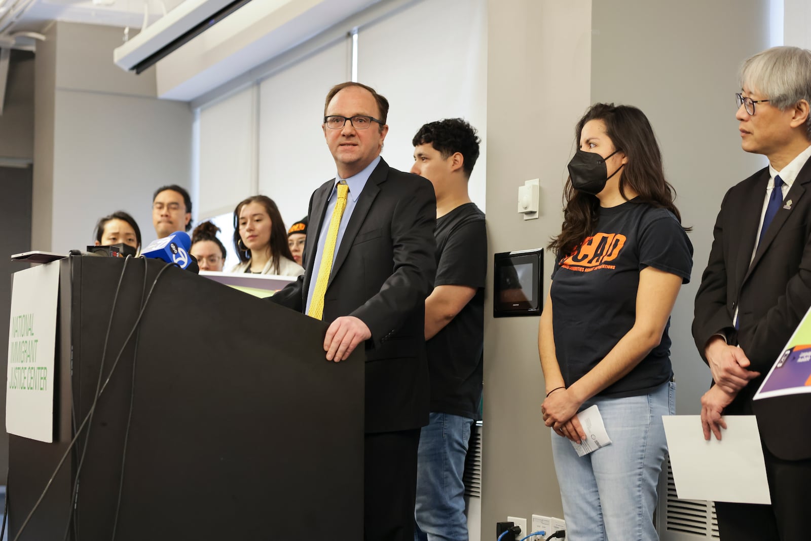 Mark Fleming, Associate Director of Litigation at National Immigrant Justice Center and Lawyer, speaks about the unlawful arrests of 22 individual's during a press conference to announce a court action to prevent unlawful arrests the at the offices of the National Immigrant Justice Center Monday, March 17, 2025, in Chicago. (Anthony Vazquez/Chicago Sun-Times via AP)