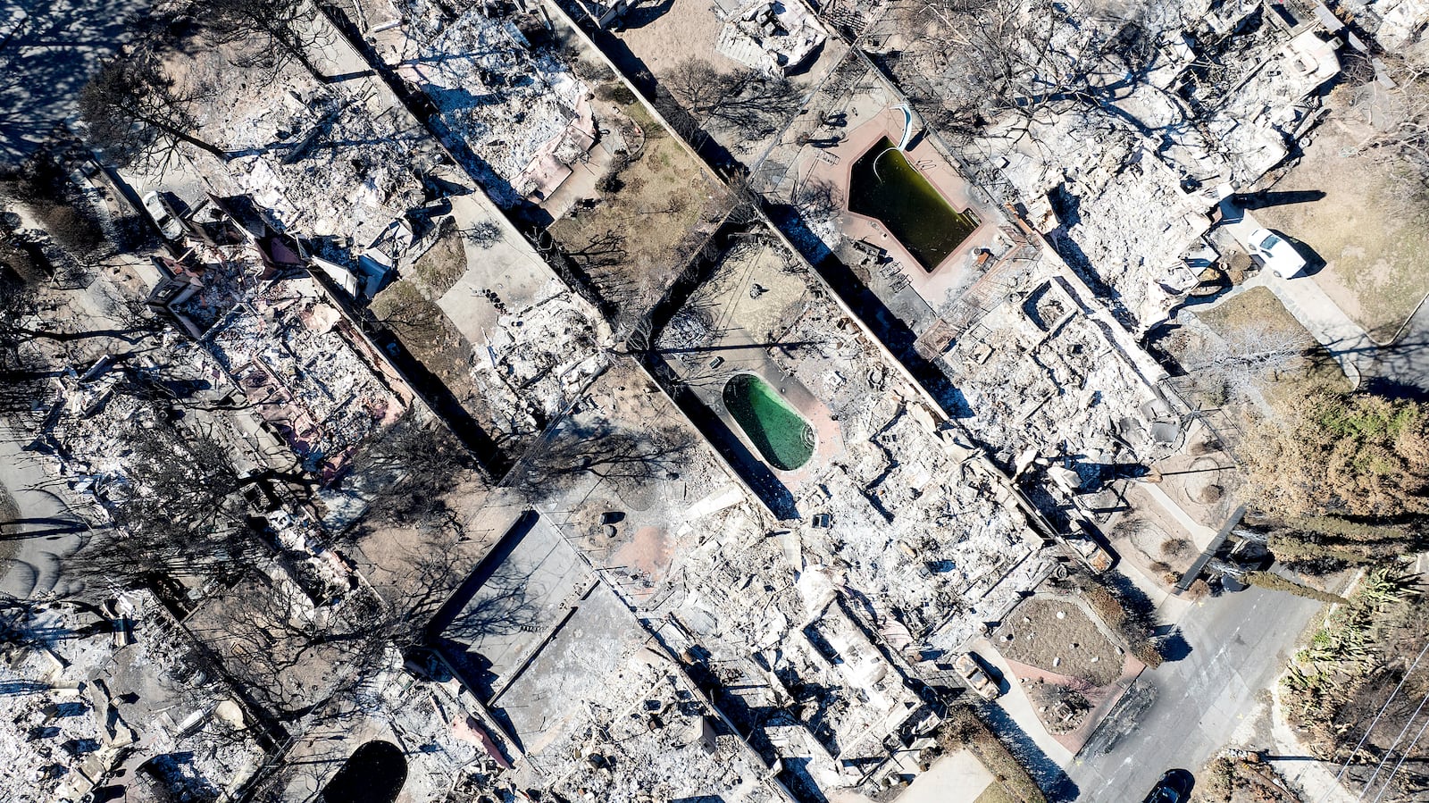 Residences destroyed by the Eaton Fire line a neighborhood in Altadena, Calif., on Tuesday, Jan. 21, 2025. (AP Photo/Noah Berger)