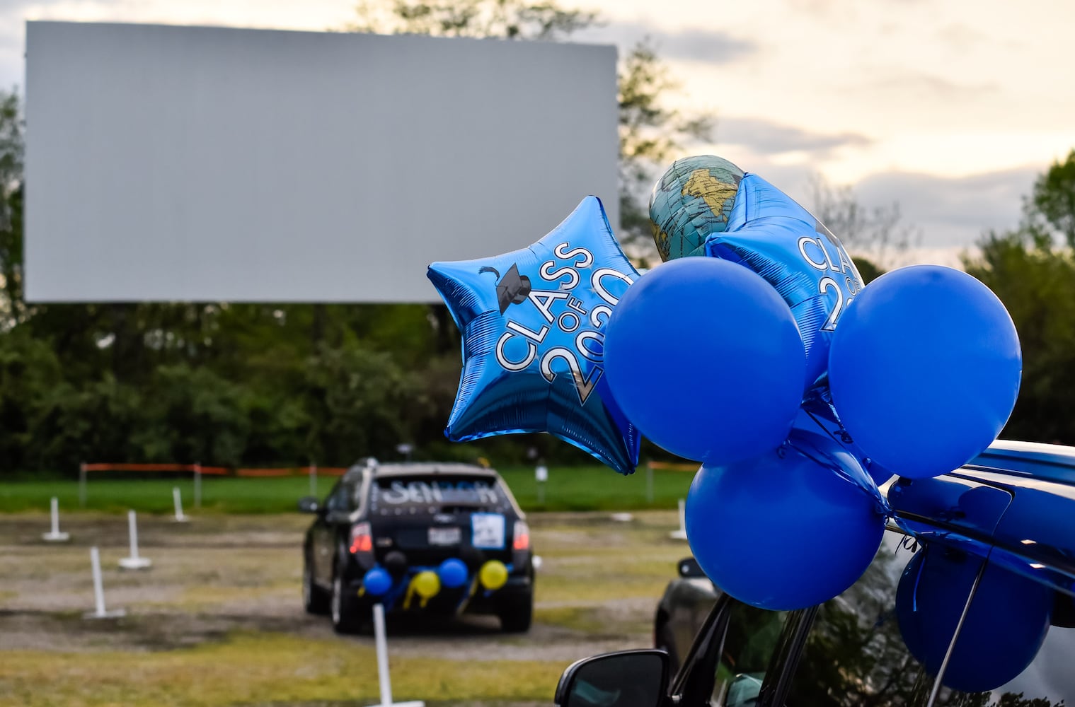 Hamilton High School seniors celebrate graduation at Holiday Auto Theatre drive-in