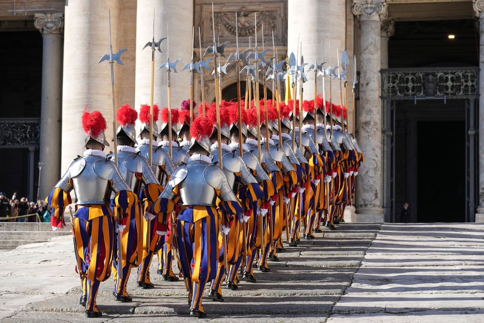 Swiss Guards march at the Vatican, Wednesday, Dec. 25, 2024. (AP Photo/Andrew Medichini)