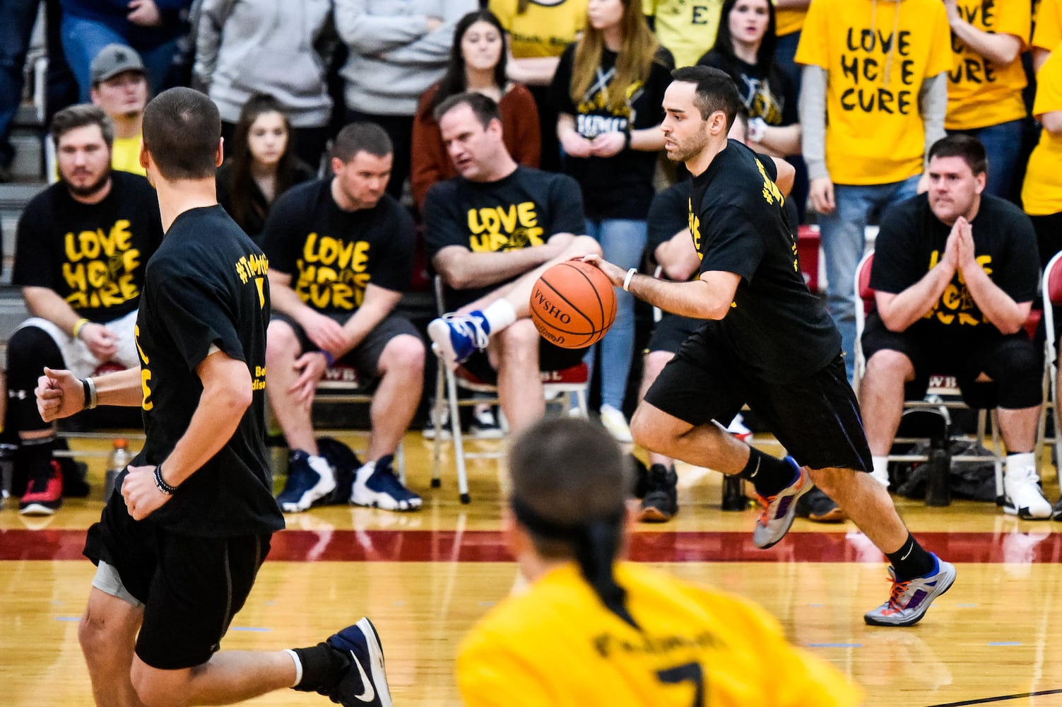 Two Butler County schools hold basketball game to benefit Madison teen battling cancer