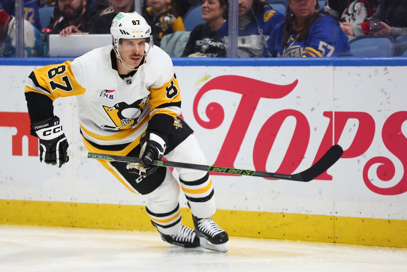 Pittsburgh Penguins center Sidney Crosby (87) skates behind the net during the second period of an NHL hockey game against the Buffalo Sabres Friday, Jan. 17, 2025, in Buffalo, N.Y. (AP Photo/Jeffrey T. Barnes)