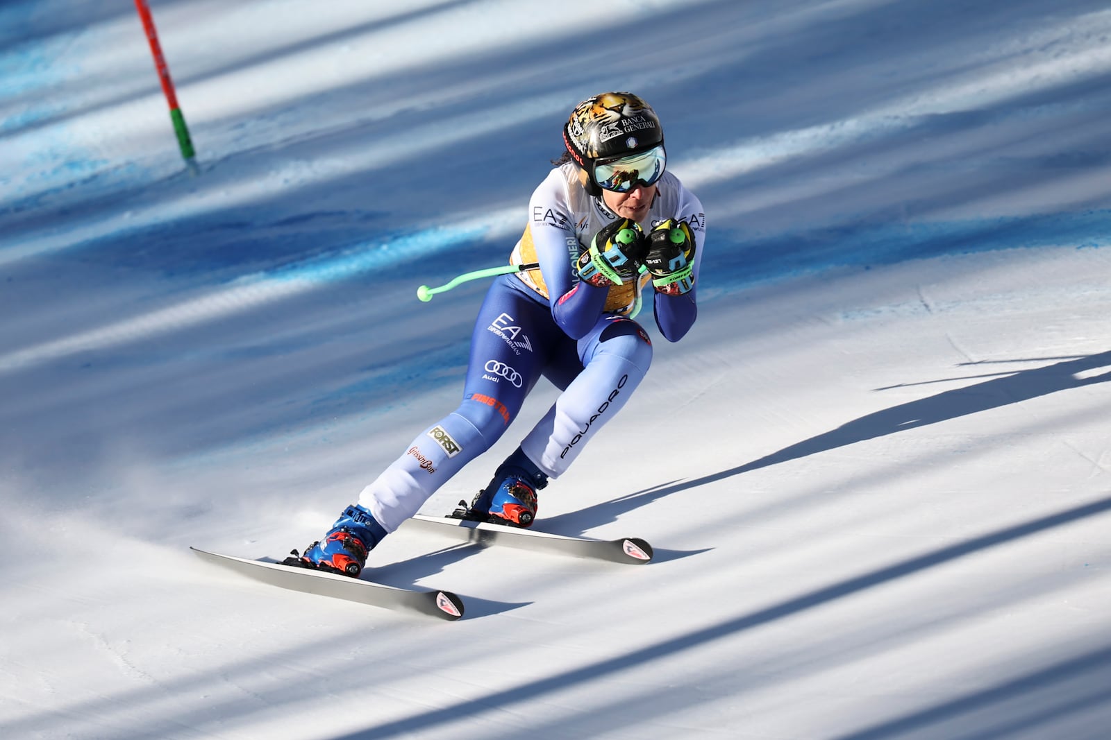 Italy's Federica Brignone speeds down the course during an alpine ski, women's World Cup downhill, in Cortina d'Ampezzo, Italy, Saturday, Jan. 18, 2025 (AP Photo/Marco Trovati)