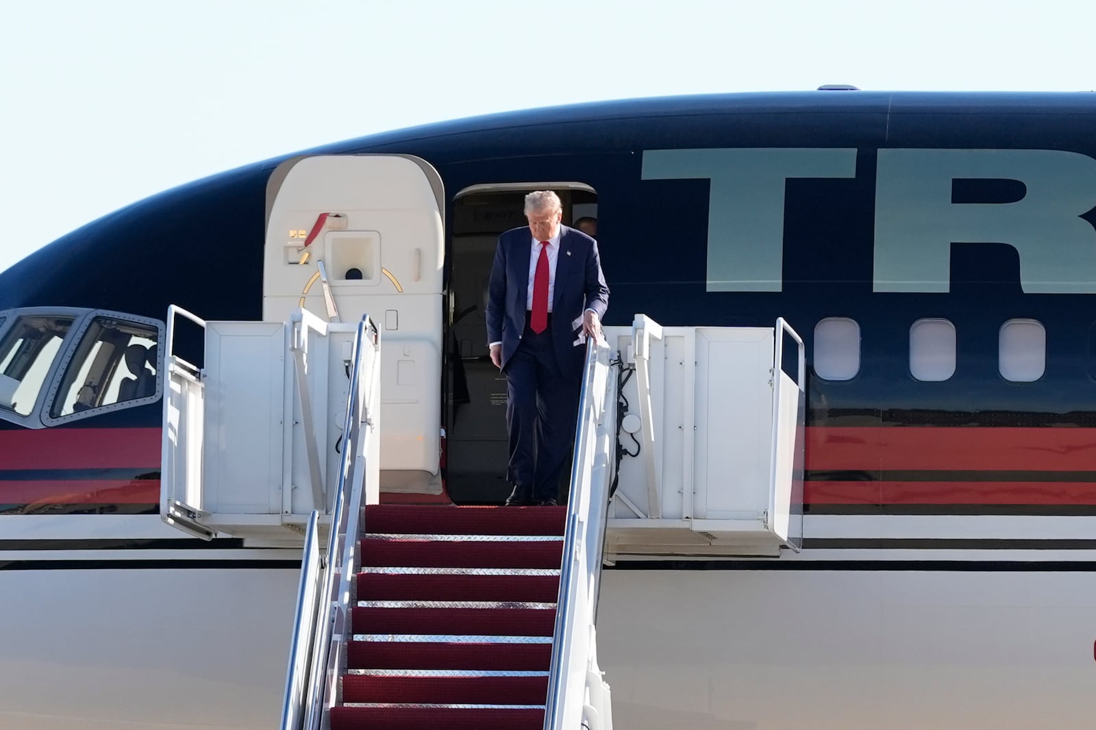 President-elect Donald Trump arrives at Joint Base Andrews, Md., Wednesday, Nov. 13, 2024. (AP Photo/Alex Brandon)