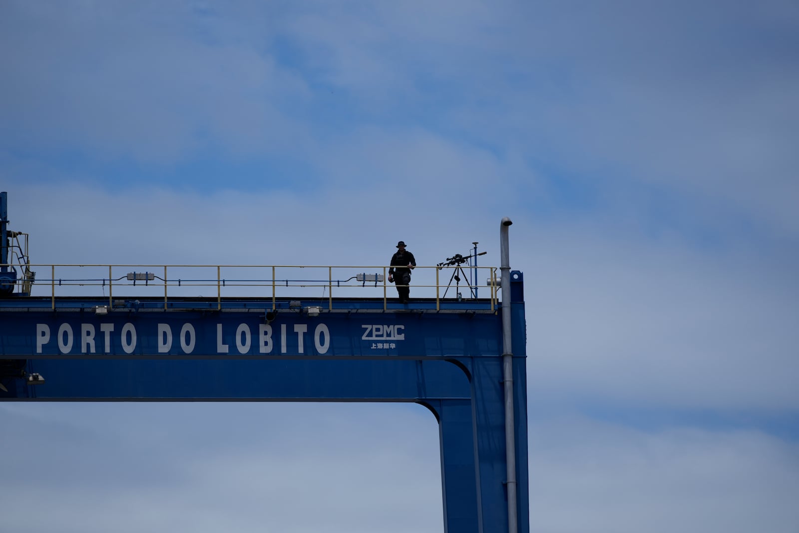 A sniper stands on a platform during President Joe Biden's tour of he Lobito Port Terminal in Lobito, Angola, on Wednesday, Dec. 4, 2024. (AP Photo/Ben Curtis)