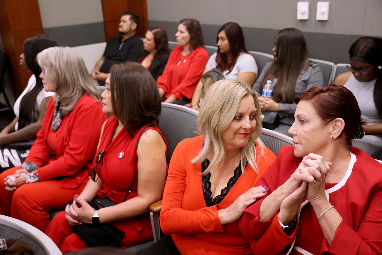 Former coworkers of Robert Telles, from right, Benet Murphy, Aleisha Goodwin, Noraine Pagdanganan and Rita Reid react to his sentencing in the killing of an investigative journalist who wrote articles critical of his conduct in office, Wednesday, Oct. 16, 2024, at the Regional Justice Center in Las Vegas. (K.M. Cannon/Las Vegas Review-Journal via AP, Pool)