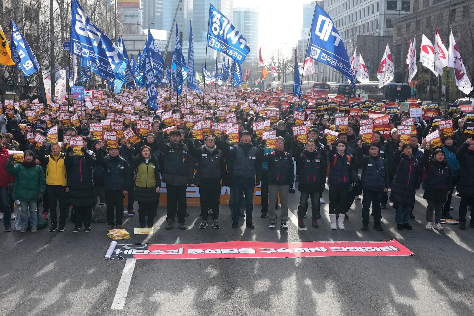 Protesters stage a rally to demand South Korean President Yoon Suk Yeol's impeachment in Seoul, South Korea, Thursday, Dec. 12, 2024. The signs read "Arrest the rebellion leader Yoon Suk Yeol." (AP Photo/Ahn Young-joon)