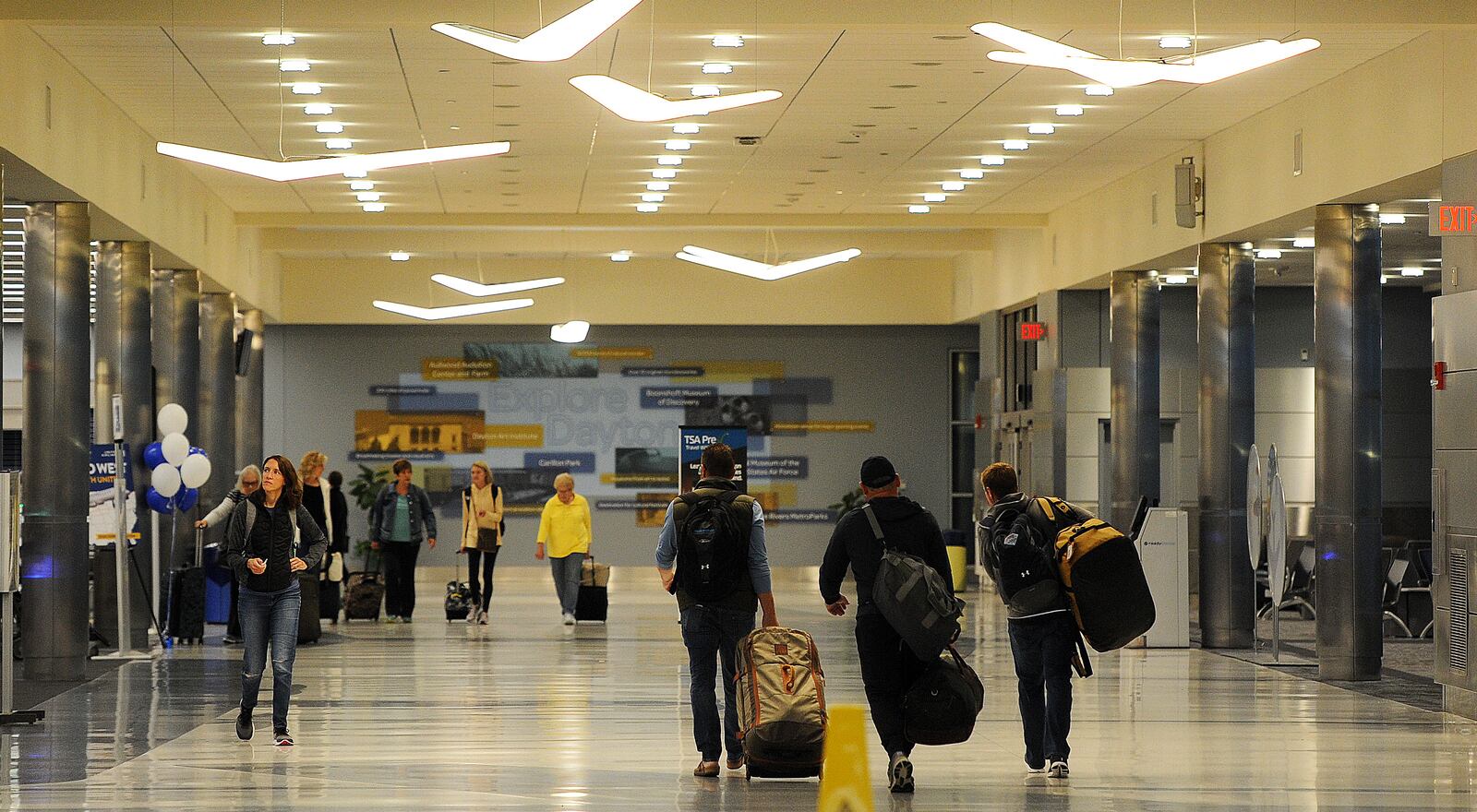 Travelers at the Dayton International Airport. MARSHALL GORBY\STAFF