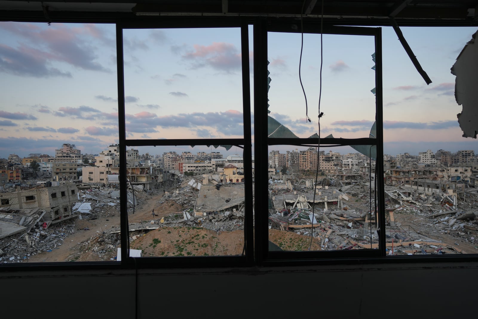 A view of an area in Gaza City destroyed during fightings between the Israeli army against Hamas, in Gaza City, Tuesday, Feb.4, 2025. (AP Photo/Abdel Kareem Hana)