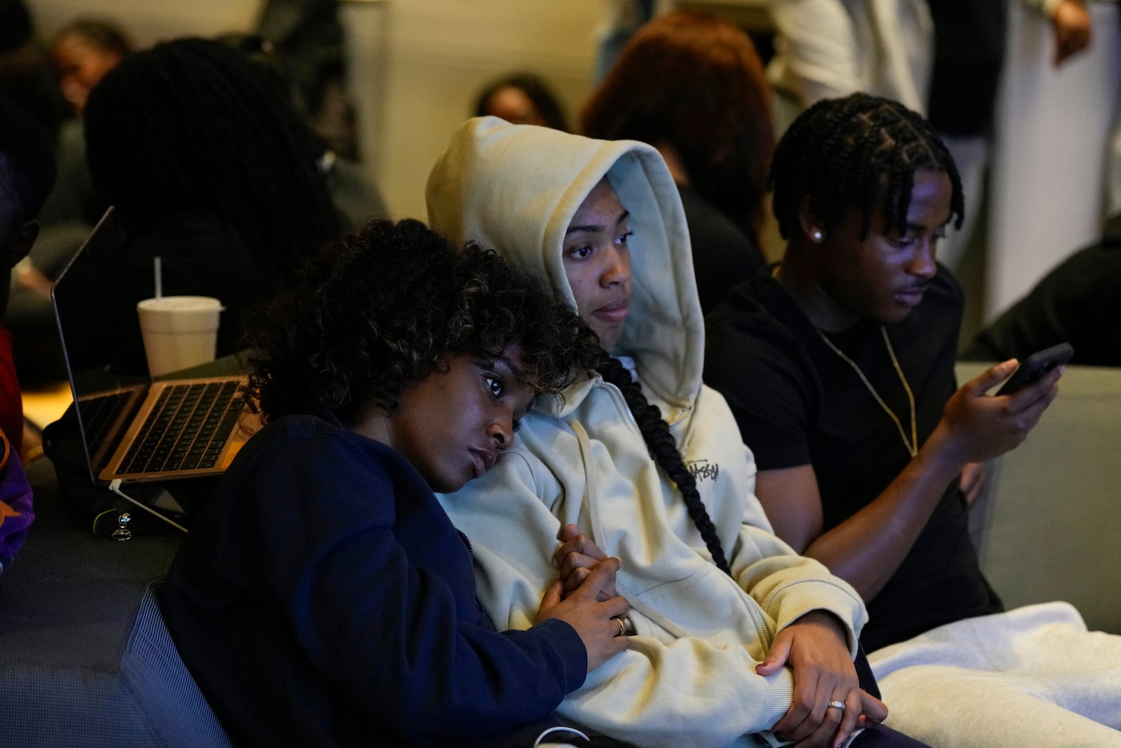 Leah Charles, left, and Tianna Adams, North Carolina A&T students, gathers with other students for an election night watch party, Tuesday, Nov. 5, 2024, in Greensboro, N.C. (AP Photo/George Walker IV)