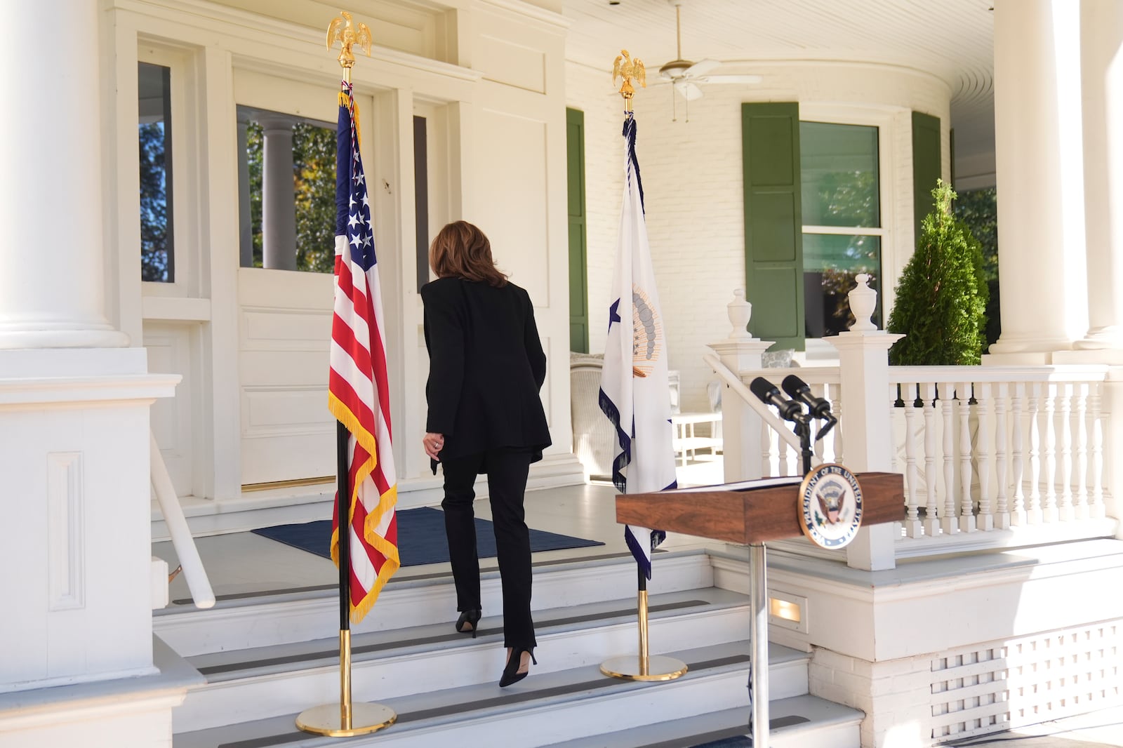 Democratic presidential nominee Vice President Kamala Harris leaves after speaking at the vice president's residence in Washington, Wednesday, Oct. 23, 2024. (AP Photo/Mark Schiefelbein)