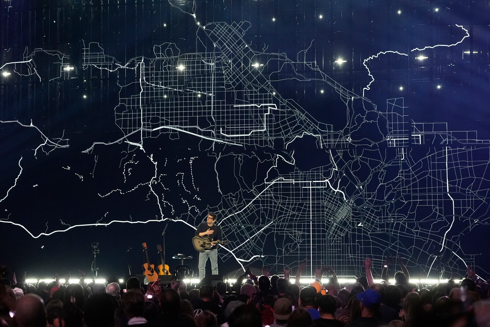 John Mayer performs during the FireAid benefit concert on Thursday, Jan. 30, 2025, at The Forum in Inglewood, Calif. (AP Photo/Chris Pizzello)