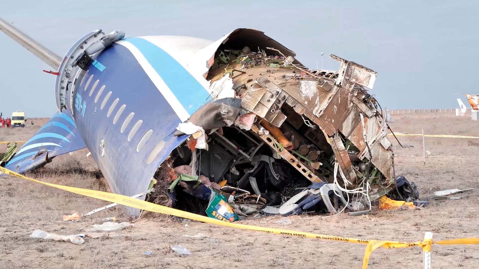 In this photo taken from a video released by the administration of Mangystau region, the wreckage of Azerbaijan Airlines Embraer 190 lies on the ground near the airport of Aktau, Kazakhstan, Wednesday, Dec. 25, 2024. (The Administration of Mangystau Region via AP)