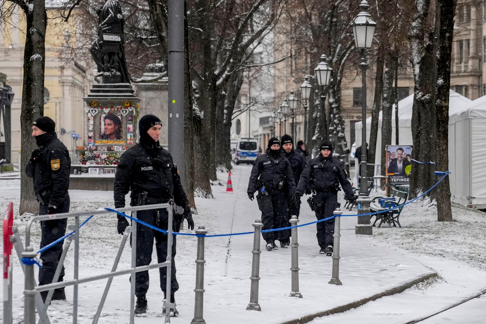 German police officers patrol on the last day the Munich Security Conference at the Bayerischer Hof Hotel in Munich, Germany, Sunday, Feb. 16, 2025. (AP Photo/Matthias Schrader)