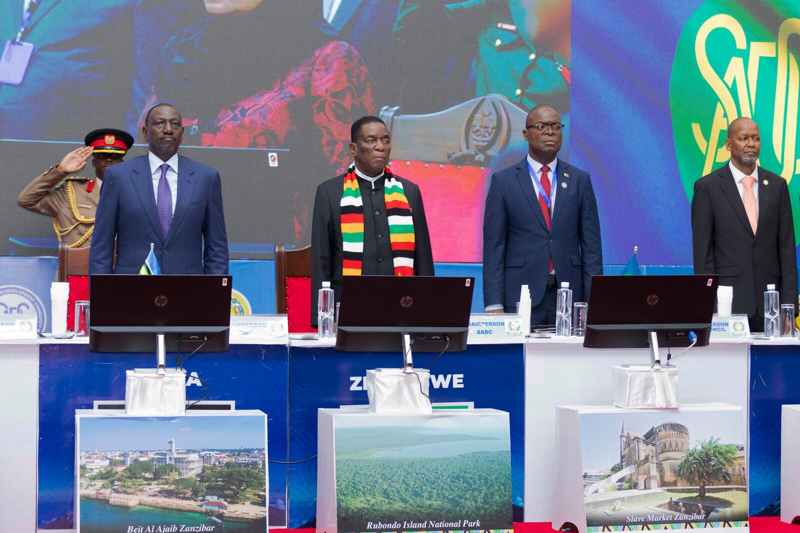 Kenyan President and East African Community (EAC) Chairman William Ruto, left, and Zimbabwe President and Southern African Development Community (SADC) Chairman Emmerson Mnangagwa, centre left, attend a joint summit to address conflict in Eastern Democratic Republic of Congo in Dar es Salaam, Tanzania Saturday, Feb. 8, 2025. (AP Photo/Elia Yunga)