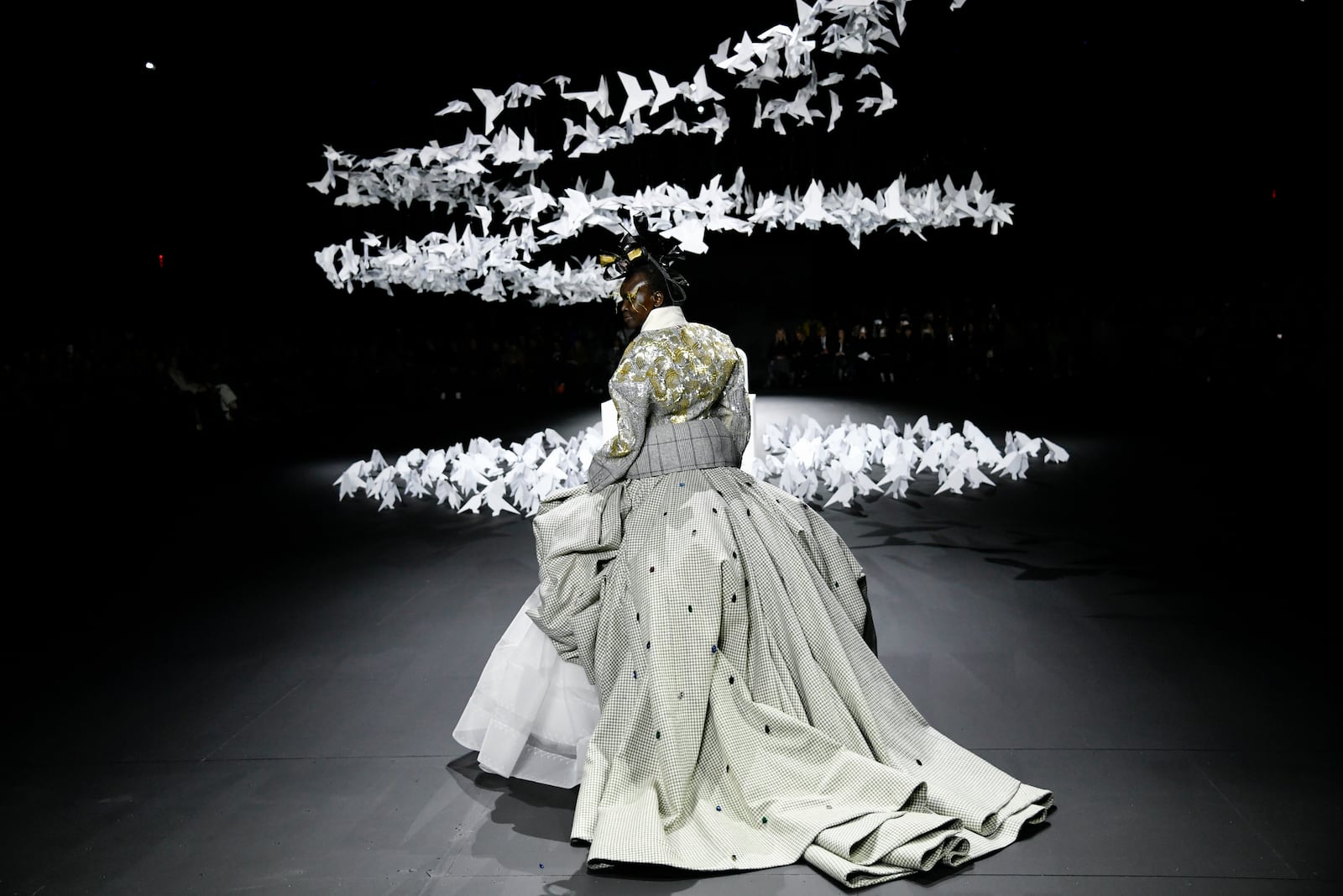 A model walks the runway during the Thom Browne Fall/Winter 2025 fashion show as part of New York Fashion Week on Tuesday, Feb. 11, 2025, at The Shed in New York. (Photo by Evan Agostini/Invision/AP)