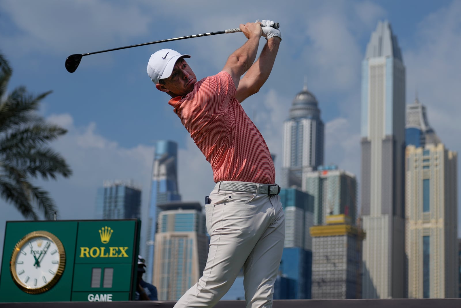 Rory McIlroy of Northern Ireland hits off the first tee during the final round of the Dubai Desert Classic golf tournament, in Dubai, United Arab Emirates, Sunday, Jan. 19, 2025. (AP Photo/Altaf Qadri)