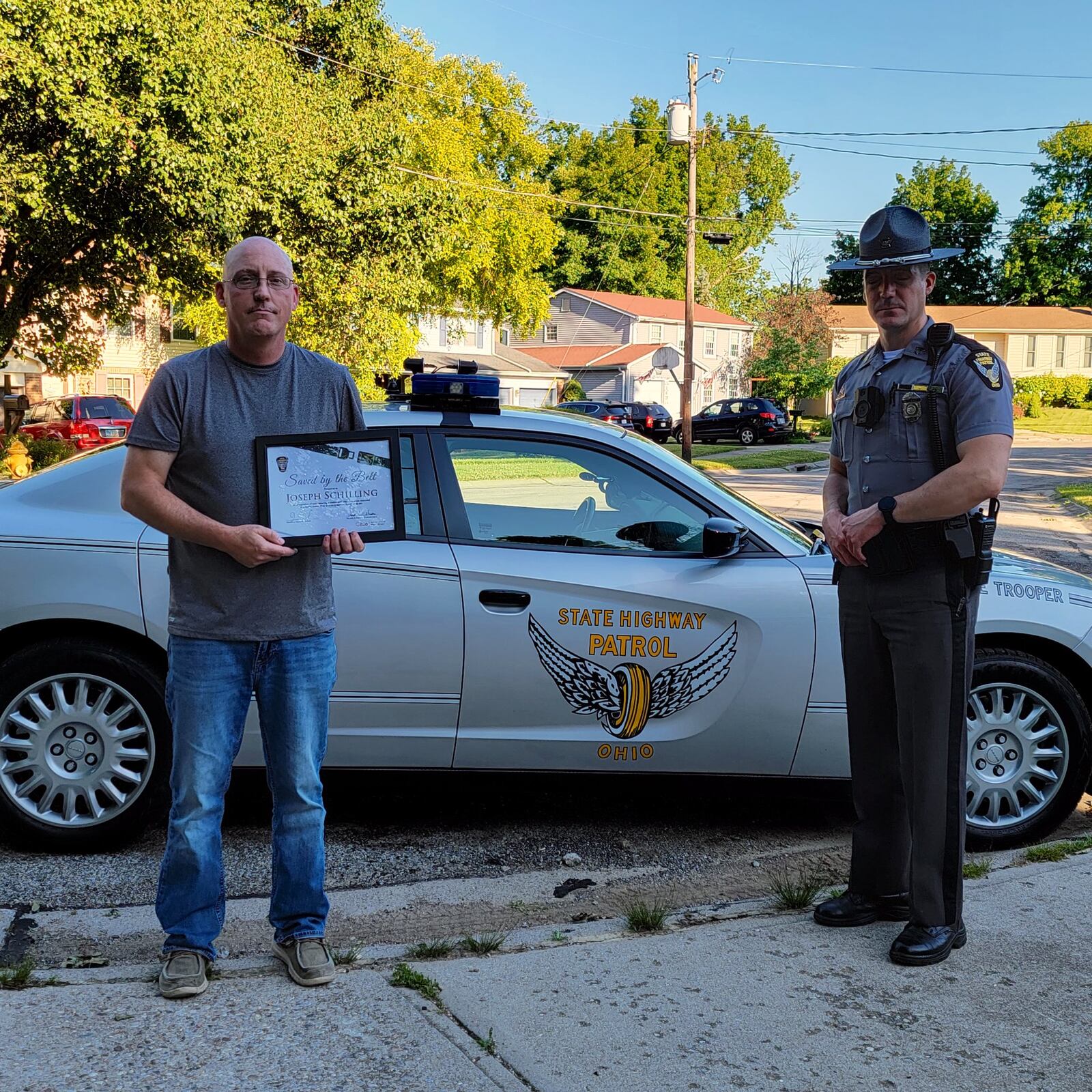 Joseph Shilling of Colerain Twp. in Hamilton County was presented with a "Saved by the Belt" certificate Monday, June 27, 2022, after he and his wife were not hurt when their pickup truck was struck and overturned April 22, 2022, on Interstate 71 in Deerfield Twp. CONTRIBUTED