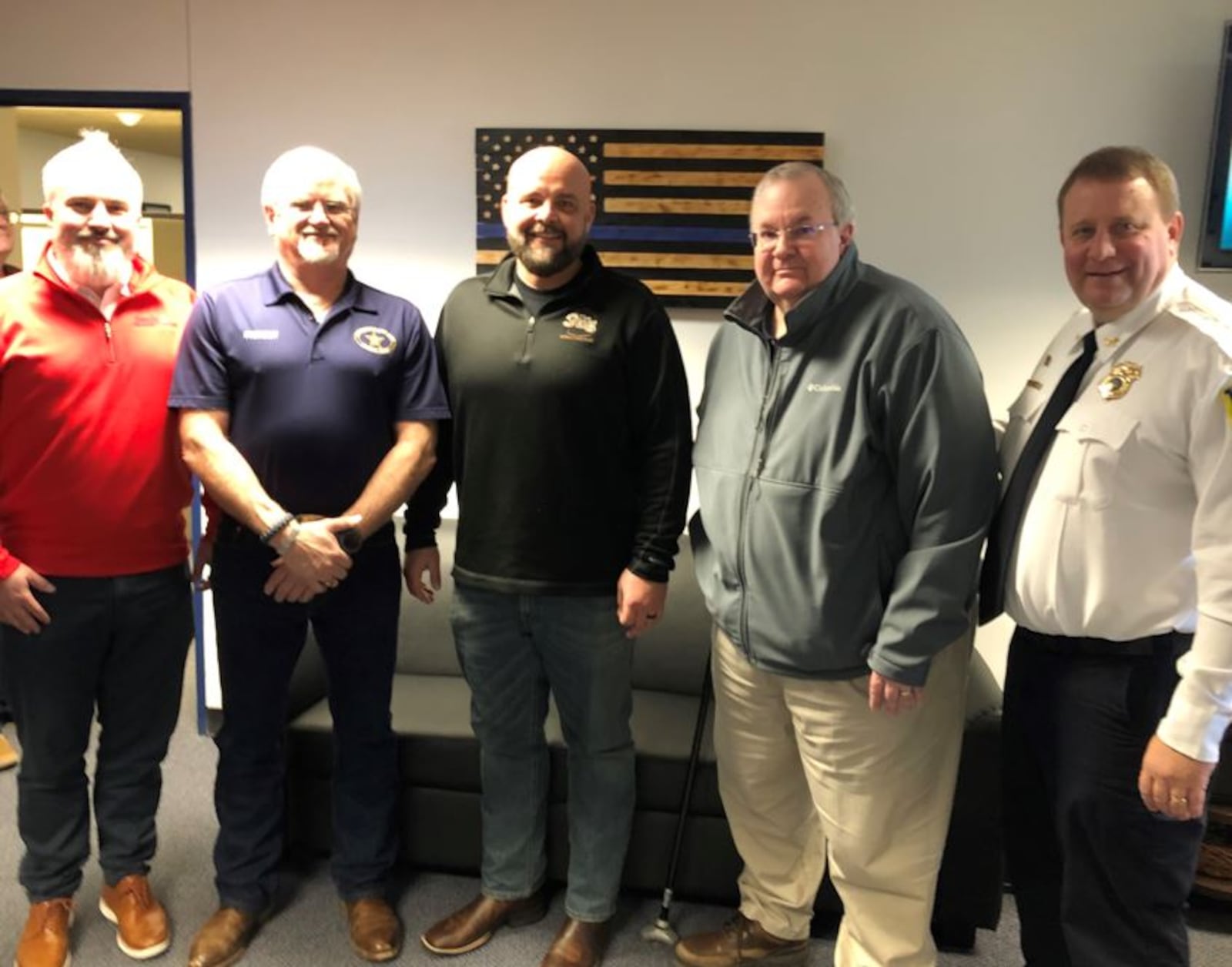 From left, Bryan Black, Perry Davis, Donnie Osborne, Jon Stiles and Police Chief David Birk attended a $20,000 check presentation last week for the FOPA. Some of the money will be used to purchase and maintain the Police Memorial at Woodside Cemetery. RICK McCRABB/STAFF