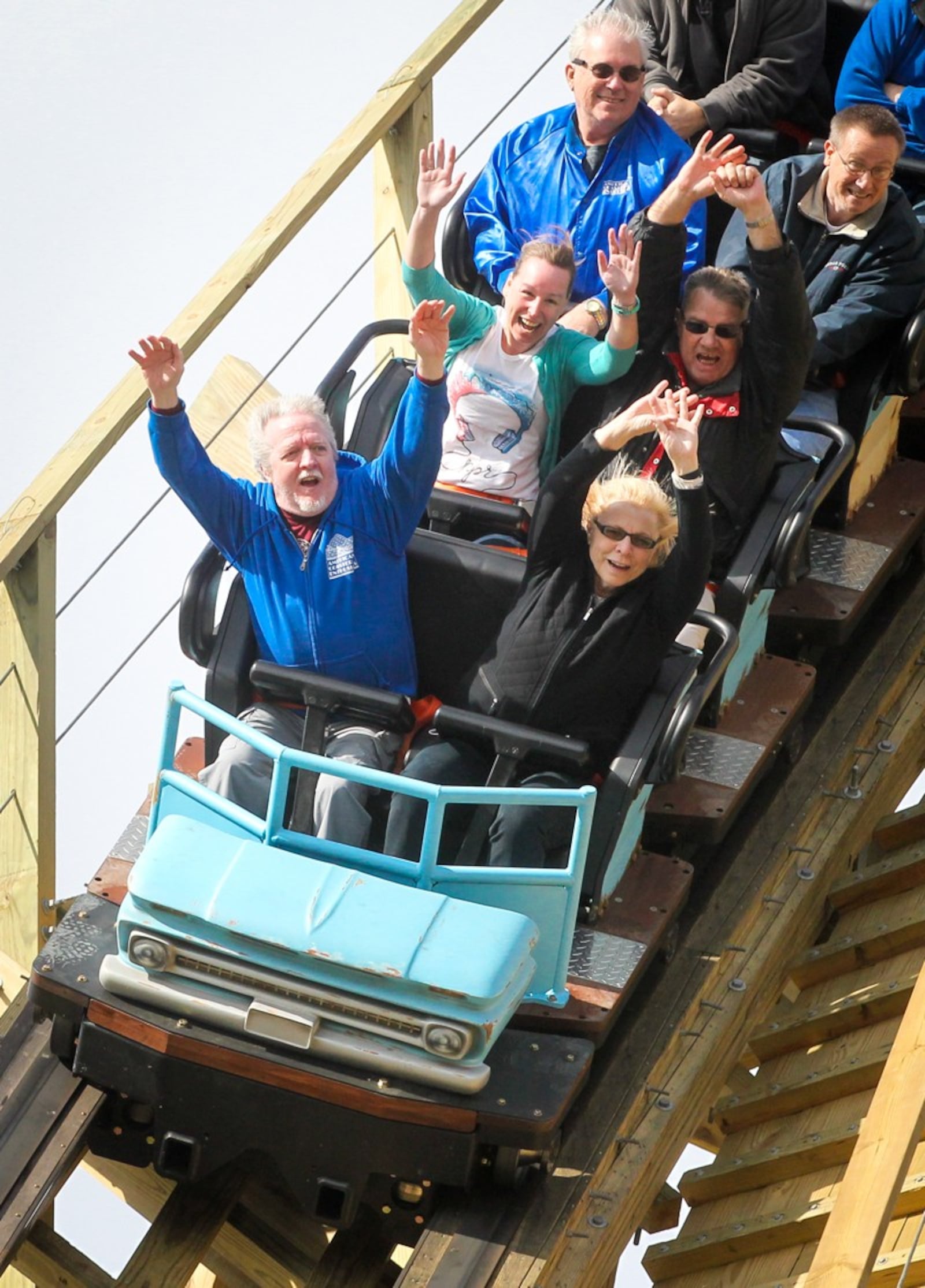 Riders enjoy the new wooden roller coaster Mystic Timbers at Kings Island on Thursday, April 13. The ride opens to the public on Saturday. GREG LYNCH / STAFF