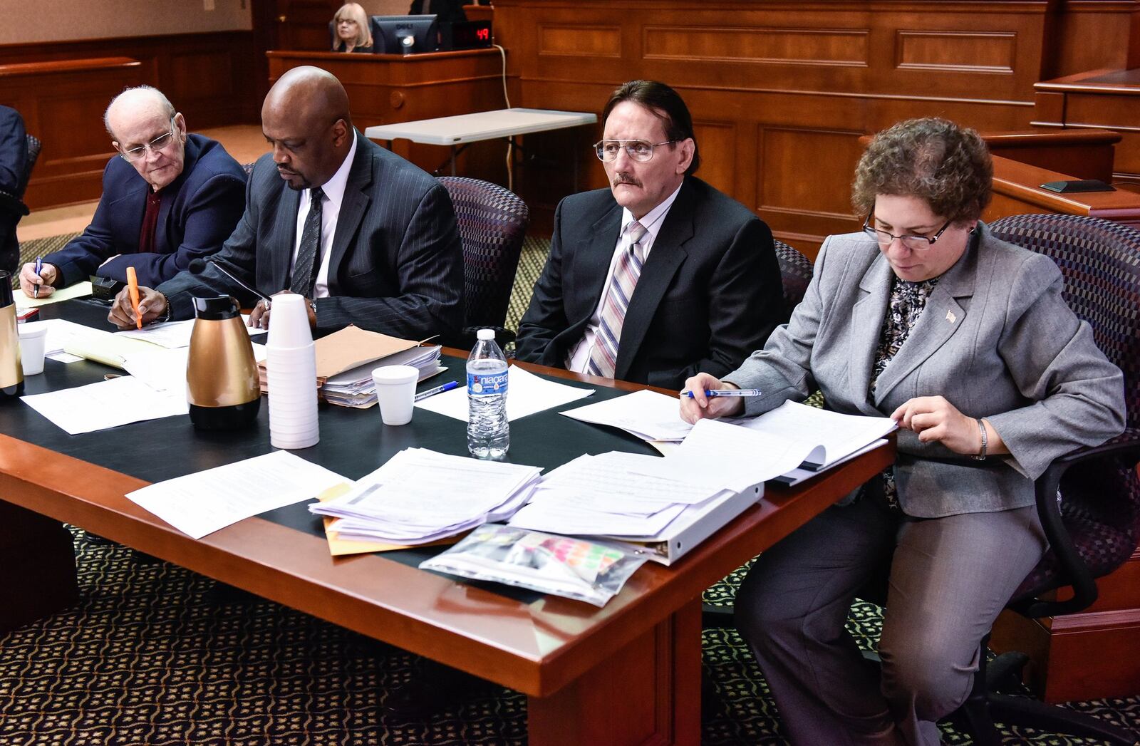 Lester Park, left, with attorney David Washington, and William Tucker, with attorney Tamara Sack sit for jury selection Monday, Nov. 6, for their trial in Butler County Common Pleas Court in Hamilton. Parker and his nephew Tucker are charged with murder and arson in the December 2015 fire on Pater Avenue that killed Hamilton firefighter Patrick Wolterman. NICK GRAHAM/STAFF