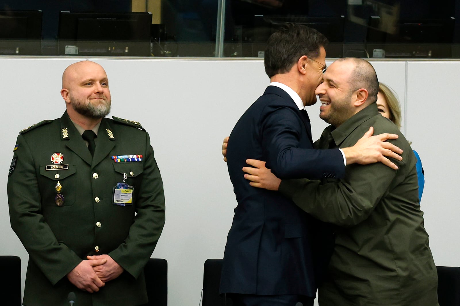 Ukraine's Defense Minister Rustem Umerov, right, is greeted by NATO Secretary General Mark Rutte during a meeting of the Ukraine Defense Contact group at NATO headquarters in Brussels, Wednesday, Feb. 12, 2025. (AP Photo/Omar Havana)