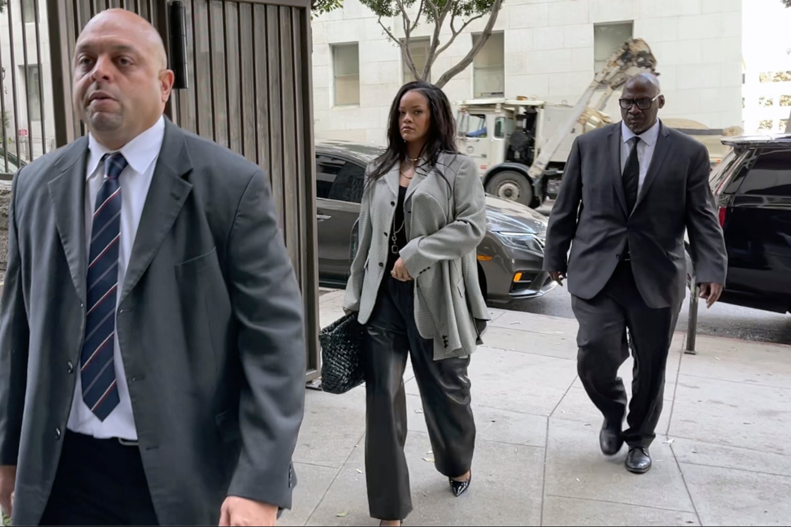 Singer Rihanna, center, returns to Clara Shortridge Foltz Criminal Justice Center in Los Angeles on Friday, Jan. 31, 2025. (AP Photo/Liam McEwan)