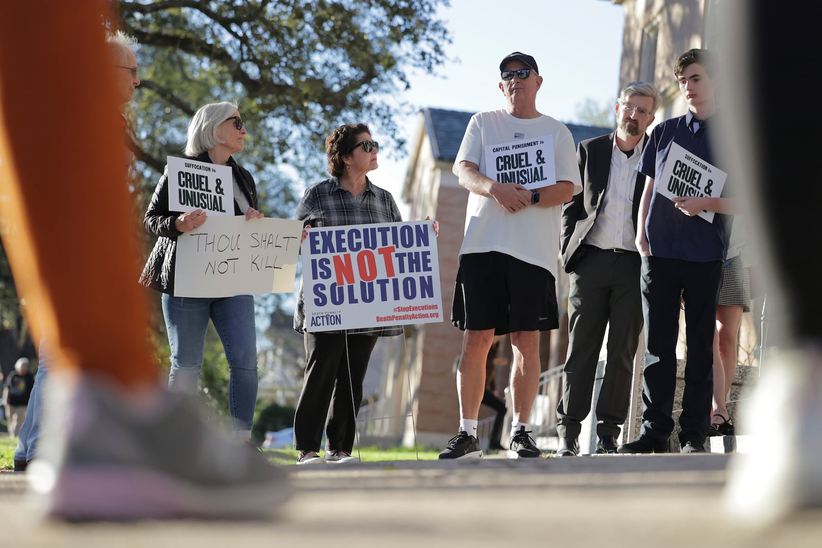 People gather in front of First Grace United Methodist Church in New Orleans for a prayer vigil in opposition to the execution of Jessie Hoffman Jr., Tuesday, March 18, 2025. (Brett Duke/The Times-Picayune/The New Orleans Advocate via AP)