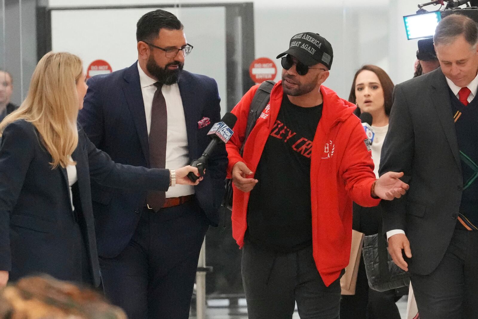 Recently pardoned by President Donald Trump after he was convicted of seditious conspiracy for his role in the January 6 attack on the U.S. Capitol, Enrique Tarrio answers questions after he arrived at Miami International Airport, Wednesday, Jan. 22, 2025, in Miami. (AP Photo/Marta Lavandier)