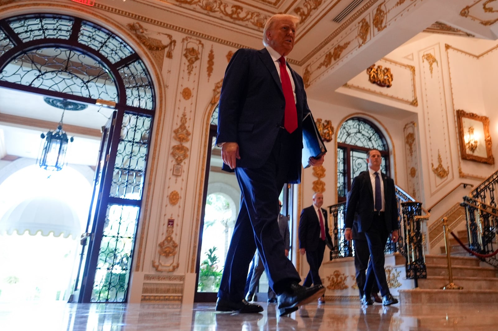 Republican presidential nominee former President Donald Trump arrives for a news conference at his Mar-a-Lago estate, Tuesday, Oct. 29, 2024, in Palm Beach, Fla. (AP Photo/Julia Demaree Nikhinson)