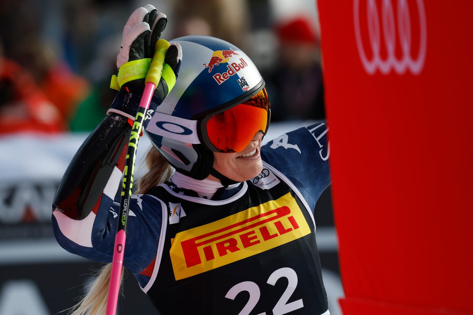 United States' Lindsey Vonn waves at the finish area after crashing during an alpine ski, women's World Cup Super-G, in Cortina d'Ampezzo, Italy, Sunday, Jan. 19, 2025 (AP Photo/Alessandro Trovati)