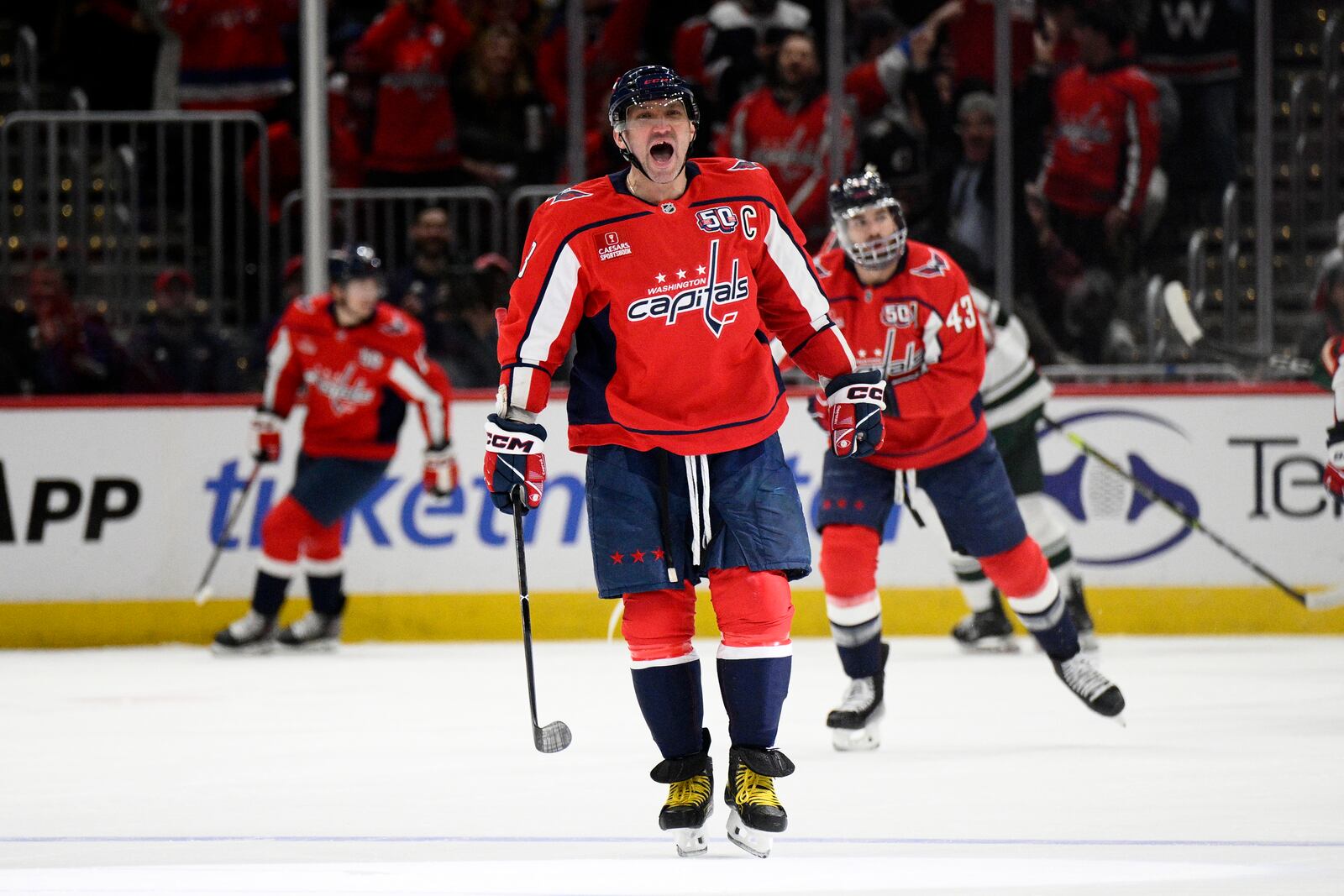 Washington Capitals left wing Alex Ovechkin (8) celebrates his goal during the second period of an NHL hockey game against the Minnesota Wild, Thursday, Jan. 2, 2025, in Washington. (AP Photo/Nick Wass)