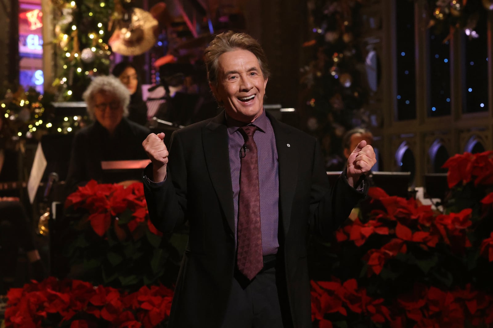 This image released by NBC shows host Martin Short during the monologue on "Saturday Night Live" on Dec. 21, 2024, in New York. (Will Heath/NBC via AP)