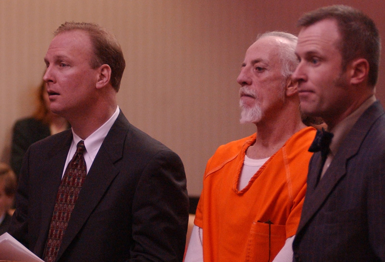 E.L. HUBBARD/JOURNALNEWS
Donald Ketterer is flanked by his attorneys, Greg Howard, left, and Chris Pagan, during his arraignment hearing on a charge of aggravated murder before Judge Oney Monday, 3/10/03.