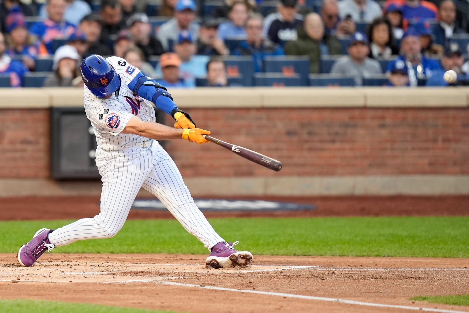 New York Mets' Pete Alonso hits a three-run home run against the Los Angeles Dodgers during the first inning in Game 5 of a baseball NL Championship Series, Friday, Oct. 18, 2024, in New York. (AP Photo/Frank Franklin II)