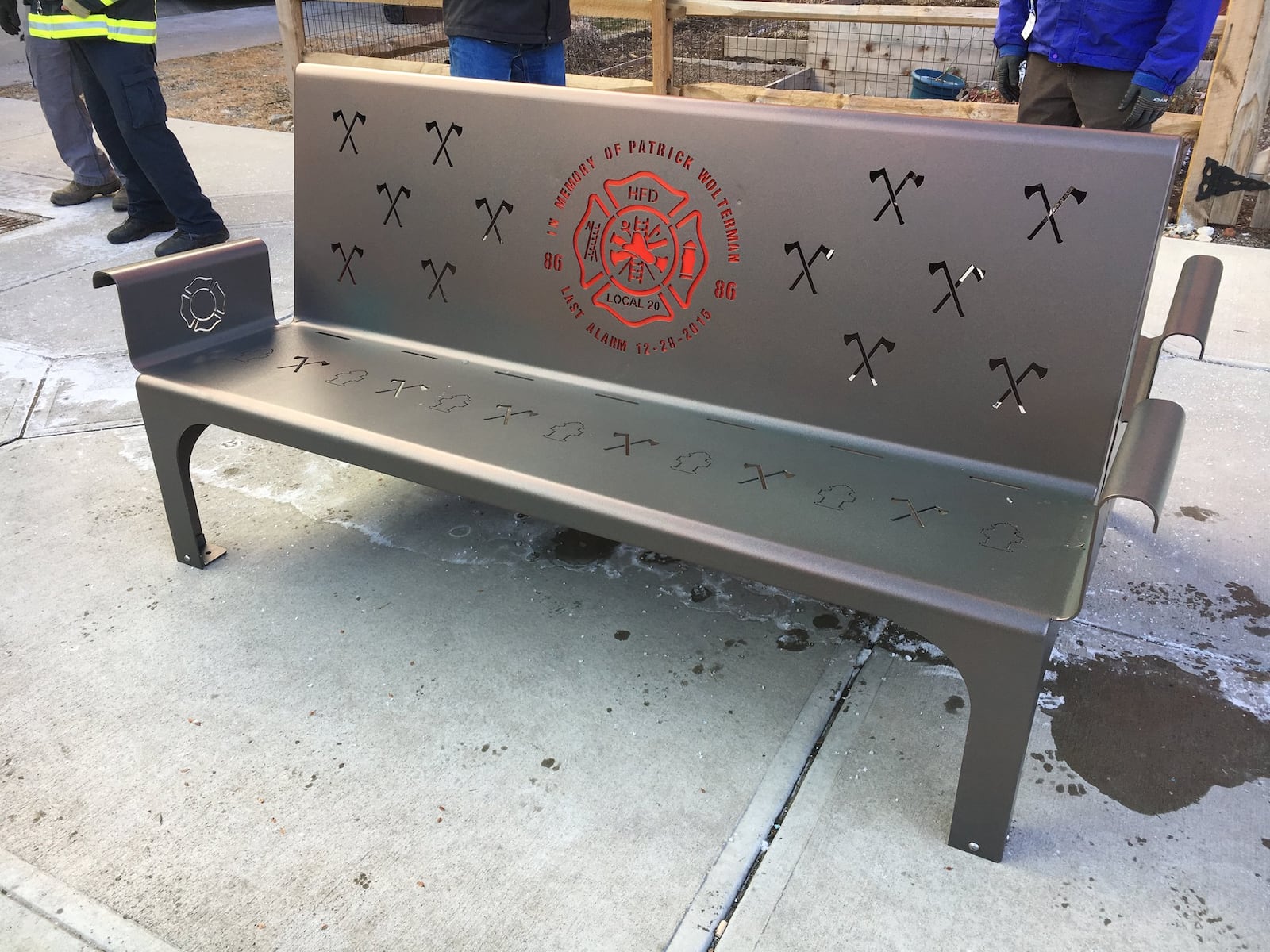 Boy Scout Daniel Nienaber constructed a bench to honor fallen firefighter Patrick Wolterman. It was dedicated Thursday in Rotary Park.