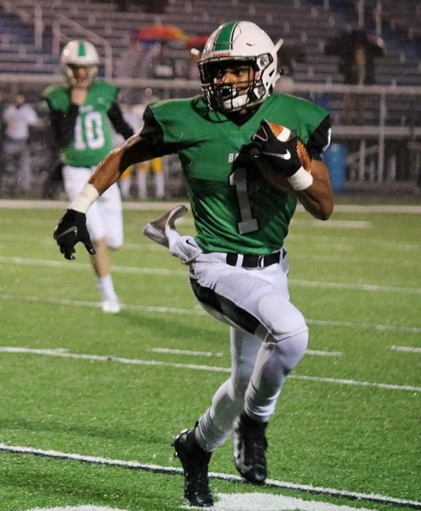 Badin’s Davon Starks runs the ball during Friday night’s game against McNicholas at Virgil Schwarm Stadium in Hamilton. Starks has cracked the 1,000-yard mark for rushing this season. CONTRIBUTED PHOTO BY TERRI ADAMS