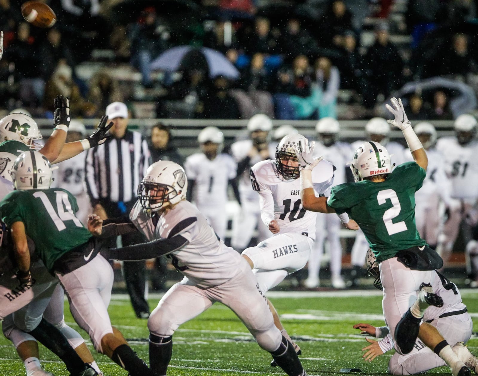 Lakota East’s Gavin Myers kicks one of his two field goals Friday night during a 20-17 victory at Mason in a Division I, Region 4 playoff opener at Dwire Field in Mason. NICK GRAHAM/STAFF