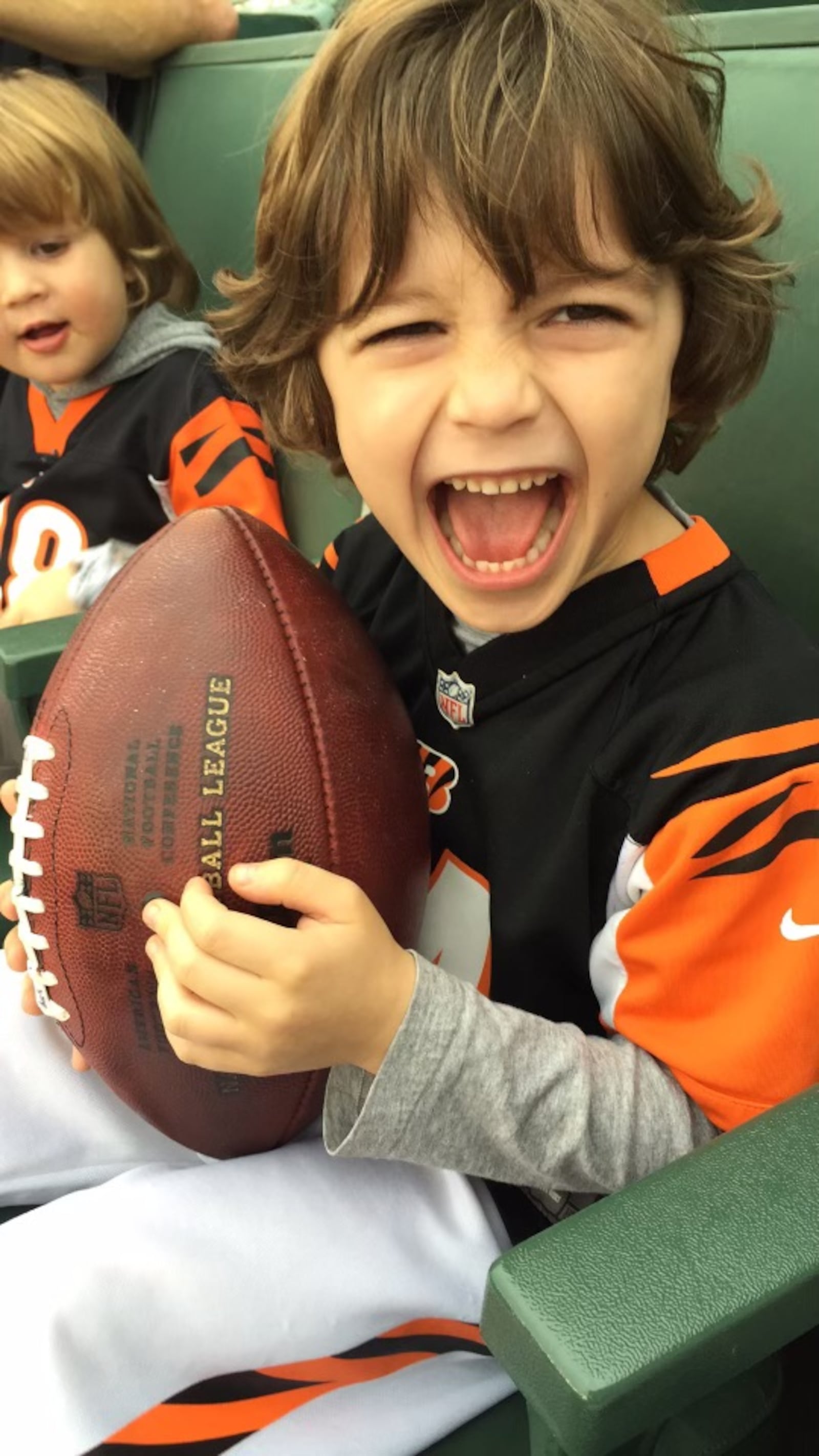 Marco Kimener was all smiles after he tossed a football on the field at Paul Brown Stadium with quarterback Andy Dalton. Dalton gave him the football. SUBMITTED PHOTO