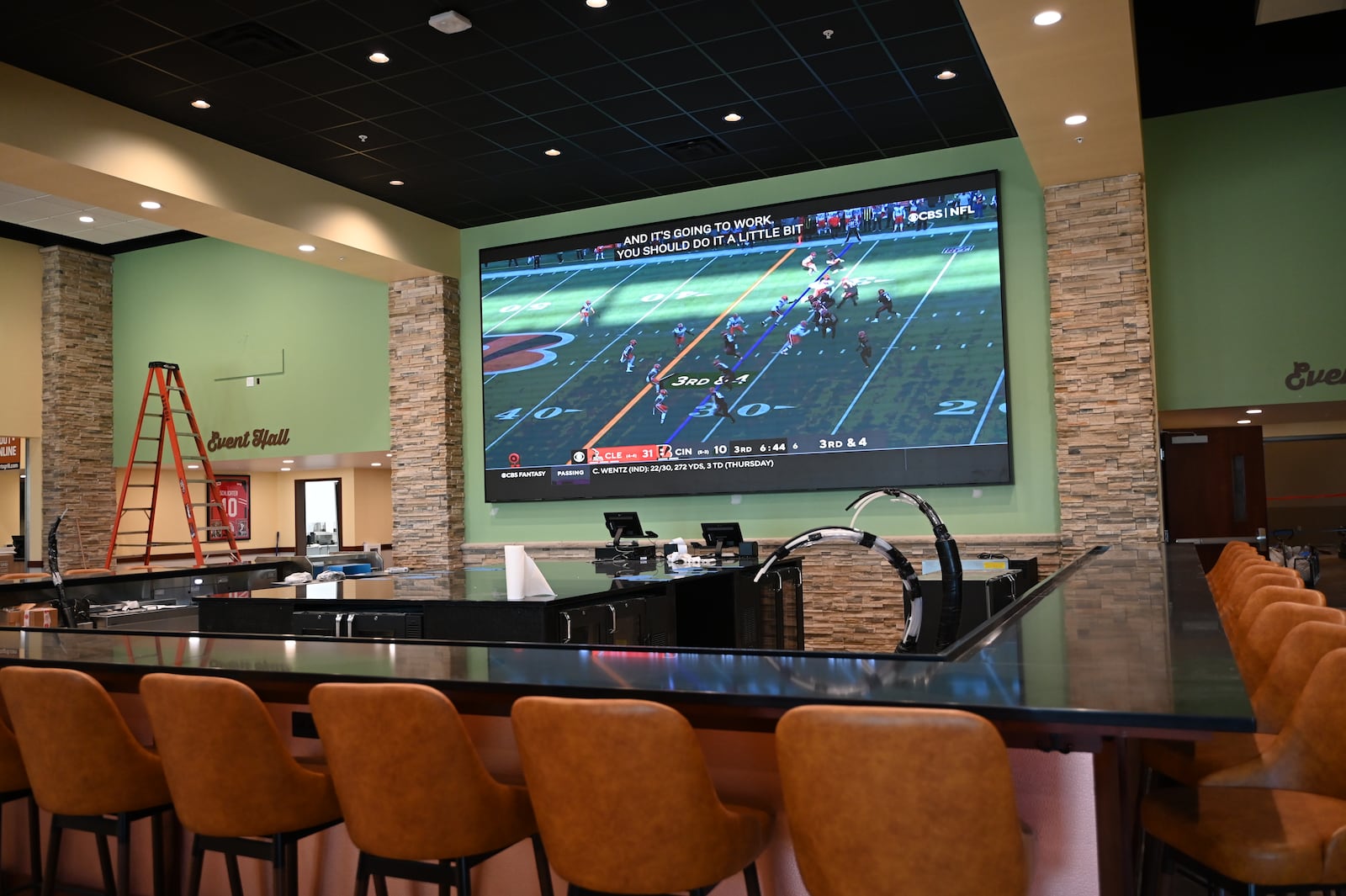 Shooters Sports Grill is about two weeks away from opening. Pictured here is the new sports bar on Thursday, May 16, 2024, on NW Washington Boulevard. Pictured is the 10-foot-by-20-foot television Todd and Alison Helton call the Hamilton Jumbotron. MICHAEL D. PITMAN/STAFF