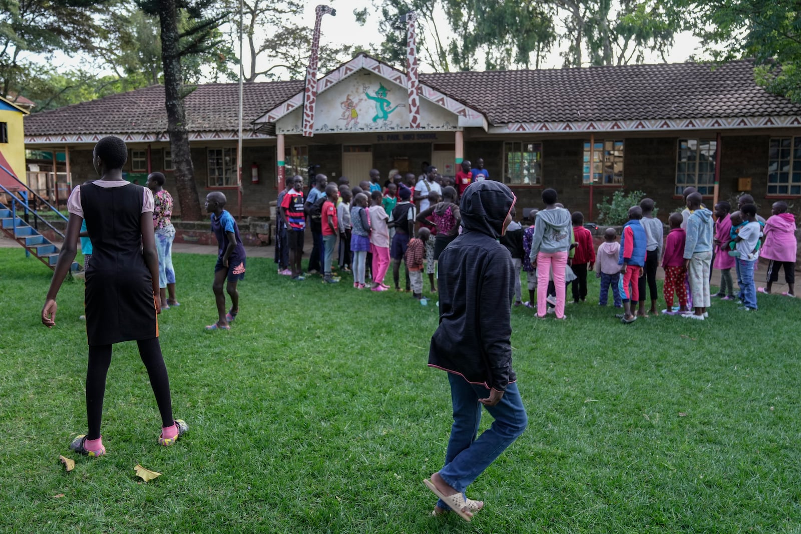 Children play at the Nyumbani Children's Home orphanage which is heavily reliant on foreign donations and cares for children with HIV whose parents died of the disease and provides them with housing, care, and PEPFAR supplied anti-retroviral drugs in Nairobi, Kenya Thursday, Oct. 6, 2025. (AP Photo/Brian Inganga)