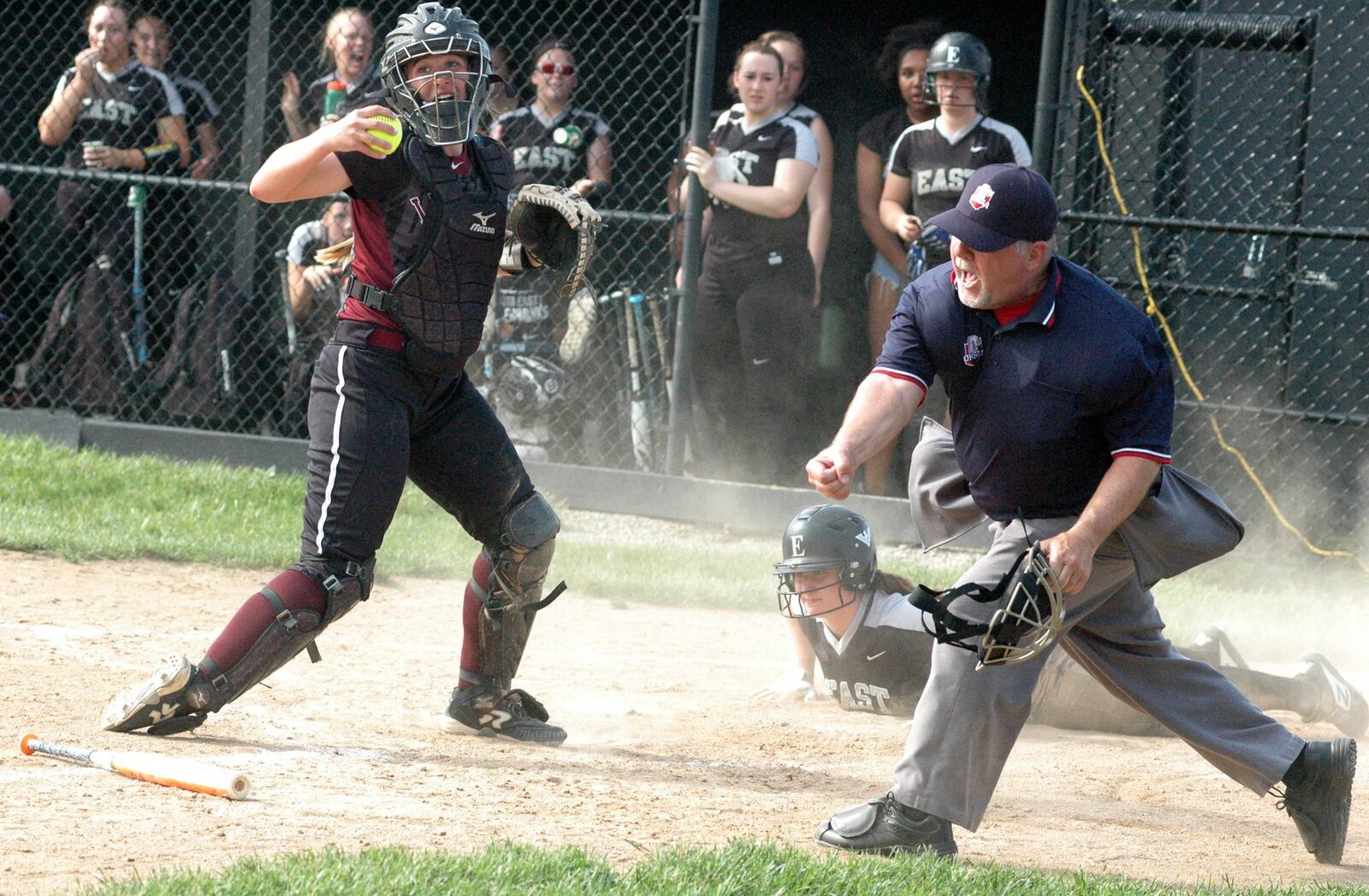 Lakota East’s Ali Lewis is out at home plate in the second inning Friday after a tag by Lebanon catcher Grace Gressly during a Division I district softball championship game at Centerville. East won 3-0. RICK CASSANO/STAFF