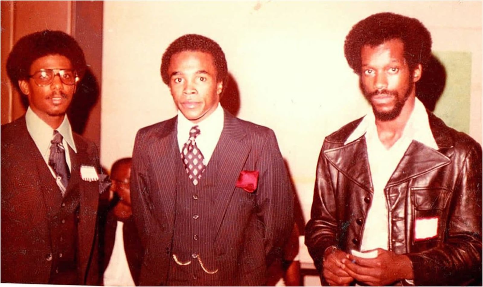 Two champions: In this photo taken in October, 1977, From left are Hamilton native Michael Levertte, director of University Center at Central State University; boxing champion "Sugar" Ray Leonard; and karate champion Bob Harris. Harris and Leonard were honored for their titles. PROVIDED