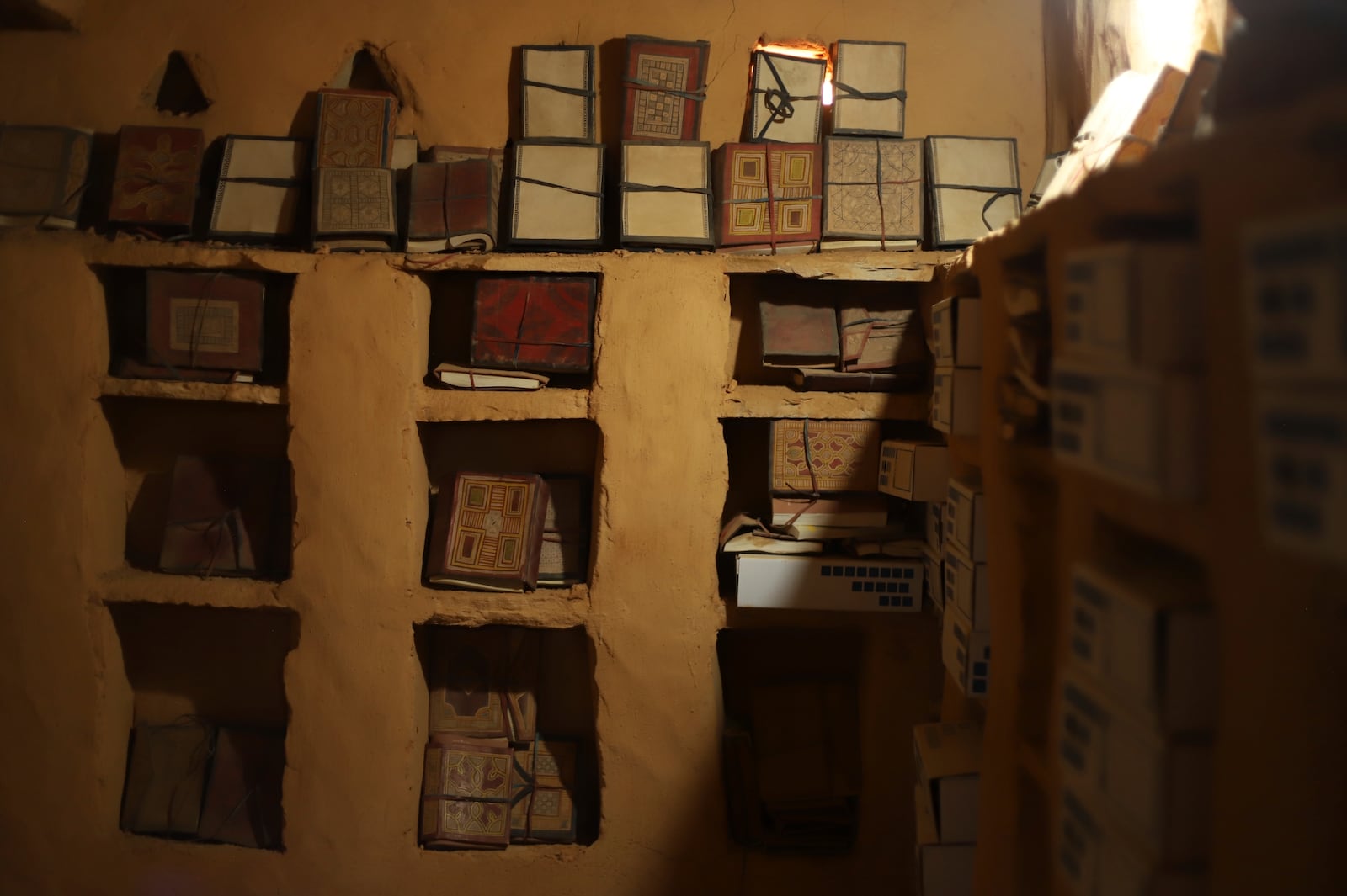 Books line the shelves of one of the libraries in Chinguetti, Mauritania on Feb. 3, 2025. (AP Photo/Khaled Moulay)