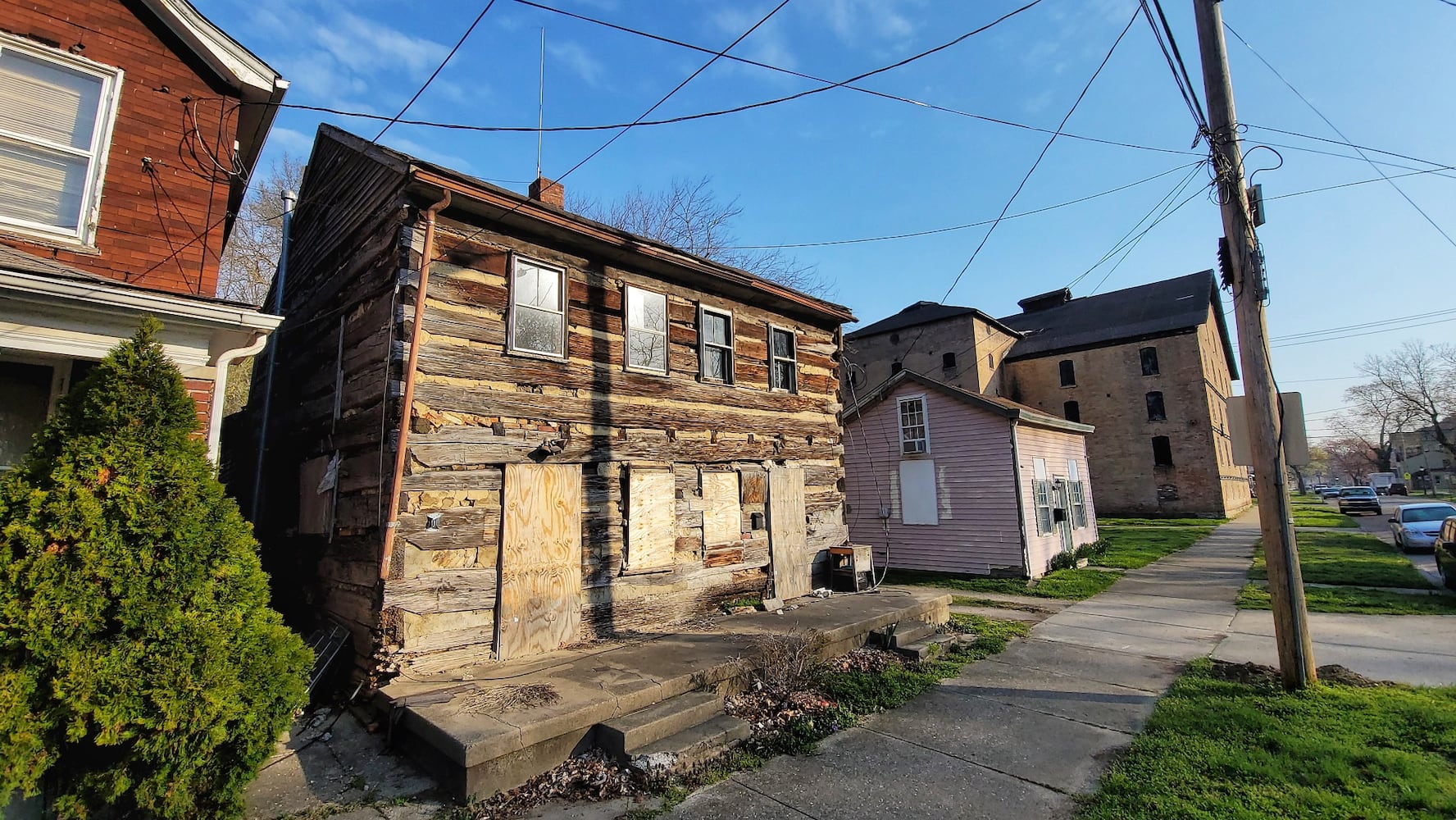 Log cabin on the chopping block